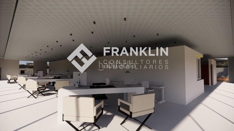 Foto e38e9f8b-9f1d-4fff-81b0-eb6d0069b294. Bâtiment à usage industriel dans Bescanó