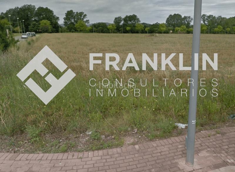 Foto 811b970a-26ce-43ba-a58b-255163525562. Solar industrial en carrer del camí ral 115 en Bescanó