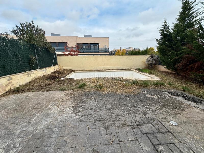 Foto b4f1339a-ced7-4ae3-847b-9d123c414449. Chalet con riscaldamento parcheggio piscina in Cabanillas del Campo