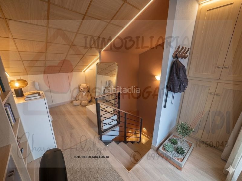 Foto 1da11ee1-6c3e-44c8-9dd0-e3897d6b4e89. Casa adossada amb xemeneia calefacció aparcament a Zuera