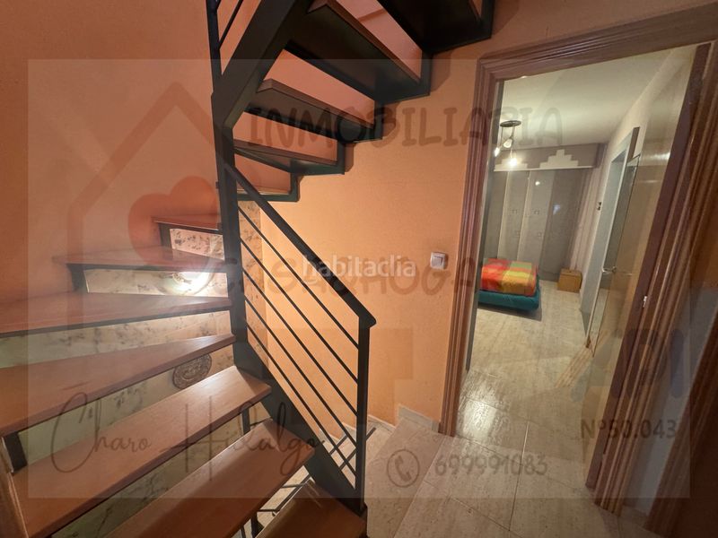 Foto 40c91a54-d9fc-4155-be4e-7b7ab063c057. Casa adossada amb xemeneia calefacció aparcament a Zuera