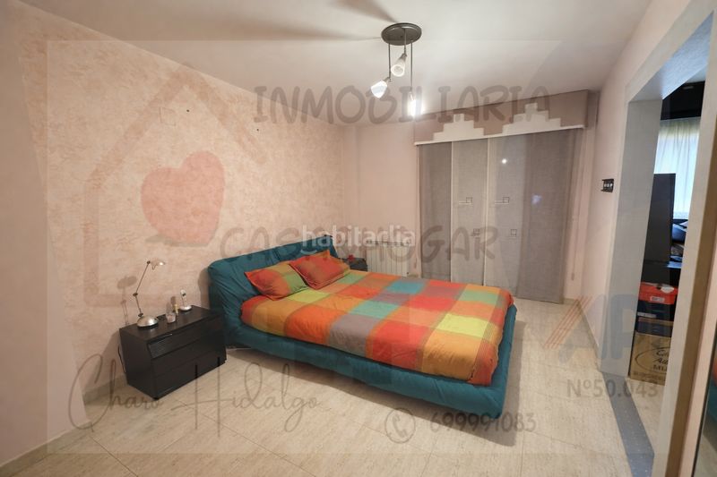 Foto 88d56eb6-3cc5-47c2-88b5-da5921789830. Casa adossada amb xemeneia calefacció aparcament a Zuera