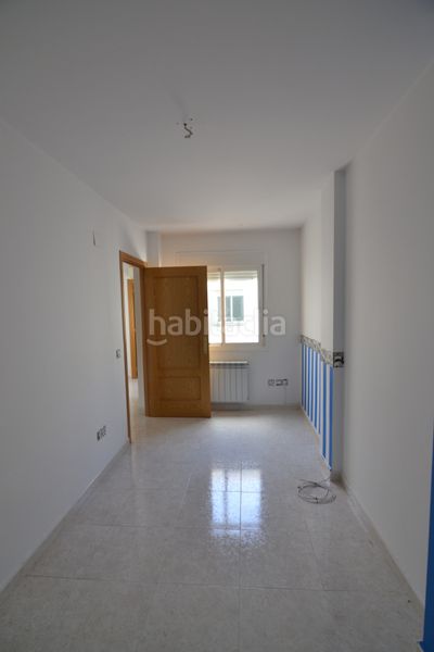 Foto 06d62a4a-b55d-400e-90f0-260f64b32712. Casa adossada amb calefacció a Malpartida de Plasencia
