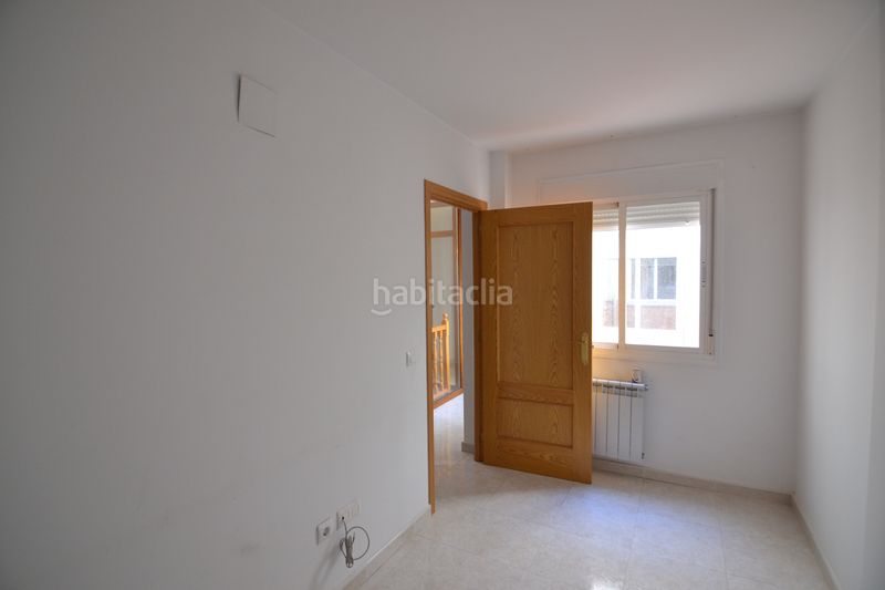 Foto 84c6e11c-e4c4-4b1b-81fd-979a680c9d5d. Casa adossada amb calefacció a Malpartida de Plasencia
