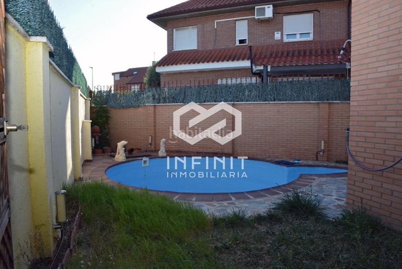 Foto 7077f5ef-92f3-40ca-83e1-e151e4eba414. Casa bifamiliare con riscaldamento parcheggio piscina in Alcalá de Henares