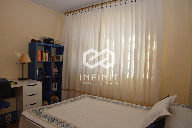 Foto e428706c-6ad6-4596-8621-f1c3a6b3bd48. Casa bifamiliare con riscaldamento parcheggio piscina in Alcalá de Henares