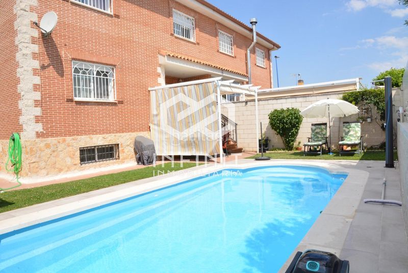 Foto 06def630-9b38-4a1e-809c-fe3e246de6eb. Casa aparellada amb calefacció aparcament piscina a Torrejón del Rey