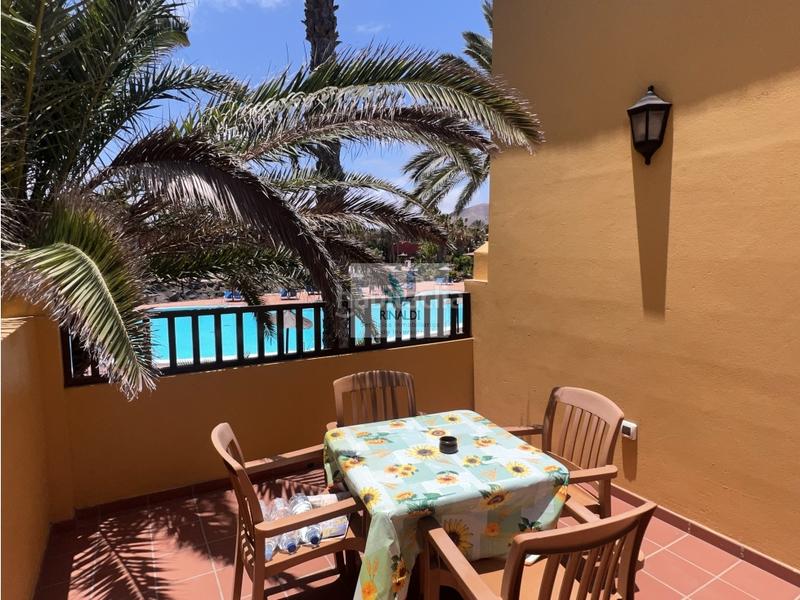 Foto 6340c475-c3b7-4865-b1a3-9b5f672cef2f. Apartamento estupendo apartamento frente piscina en oasis tamarindo 1 en Oliva (La)