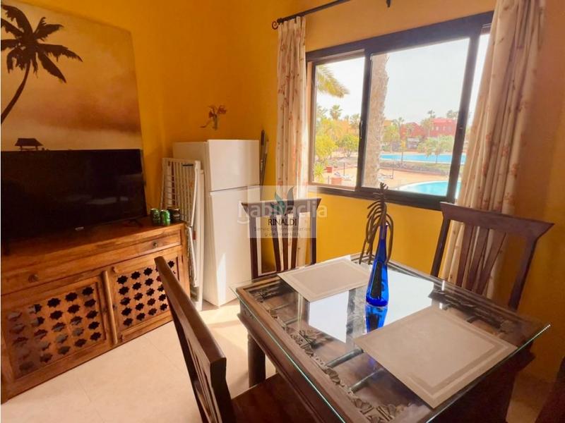 Foto f492d719-216a-4d85-b584-ba66a58c4cb2. Apartamento estupendo apartamento frente piscina en oasis tamarindo 1 en Oliva (La)