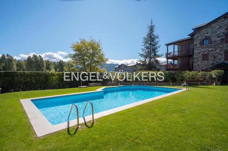 Foto f1d2d3a7-f341-4c82-ae69-edce17dcc427. Appartement mit kamin heizung parking pool in Puigcerdà