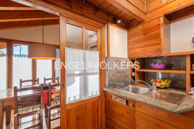 Foto 5ec2e6df-b335-4dc5-b97a-10d46de76c34. Dúplex amb xemeneia calefacció aparcament piscina a Puigcerdà