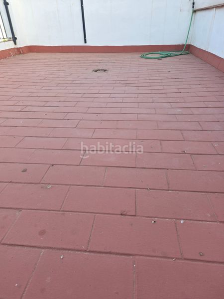 Foto 051307e4-26eb-4d13-bb07-5e6cc7419395. Casa adosada  corredera en Centro Utrera