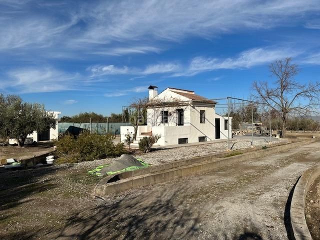 Foto d7a01fe4-e6e2-46a0-8b39-26e369c99e9e. Finca rústica a polígono lavadero 3 a La Zubia Ciudad Zubia (La)