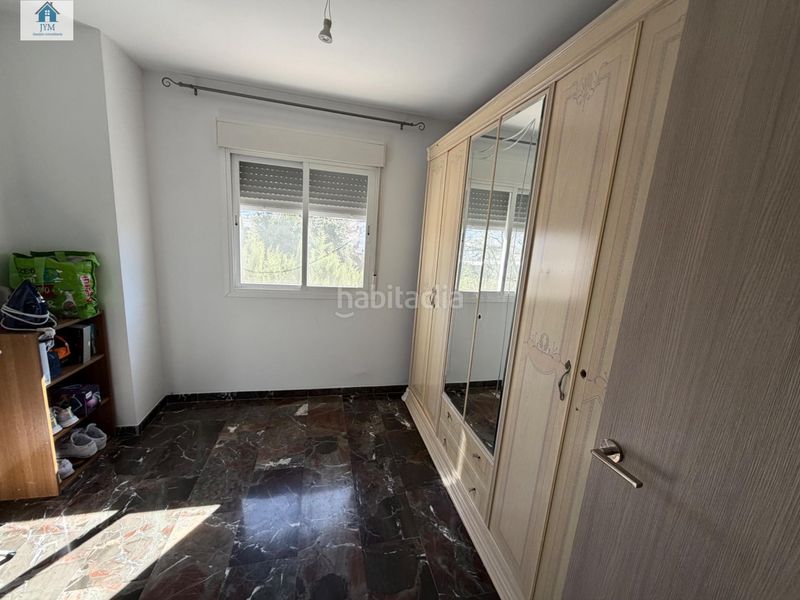Foto 15a511f8-b770-457e-b57f-f4fbe8d65d1d. Casa adossada amb aparcament a La Zubia Ciudad Zubia (La)