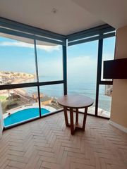 Apartament a Calahonda. Apartamento reformado en primera línea de playa con vistas panor
