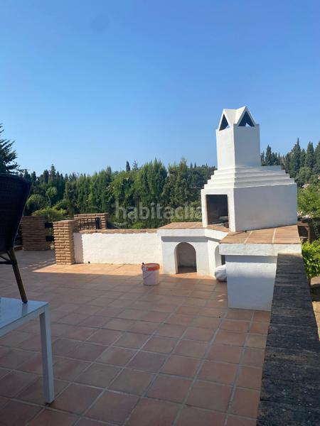 Foto 02d2cefc-48df-41be-bc0c-bd41fc8ee309. Casa con parcheggio piscina in Elviria Marbella