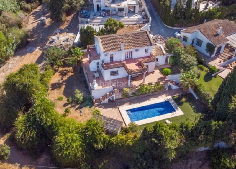 Foto ab791a7b-a6b7-48fd-92cc-79e8bfc75c24. Casa con parcheggio piscina in Elviria Marbella