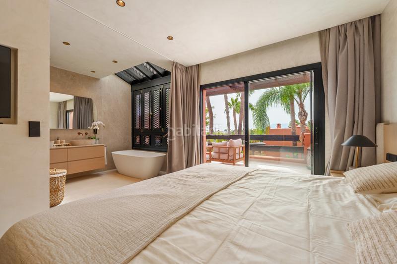 Foto c7c7e098-779b-43a8-bcc8-3ceeecc9334e. Casa a schiera con parcheggio piscina in lomas de Marbella club Marbella