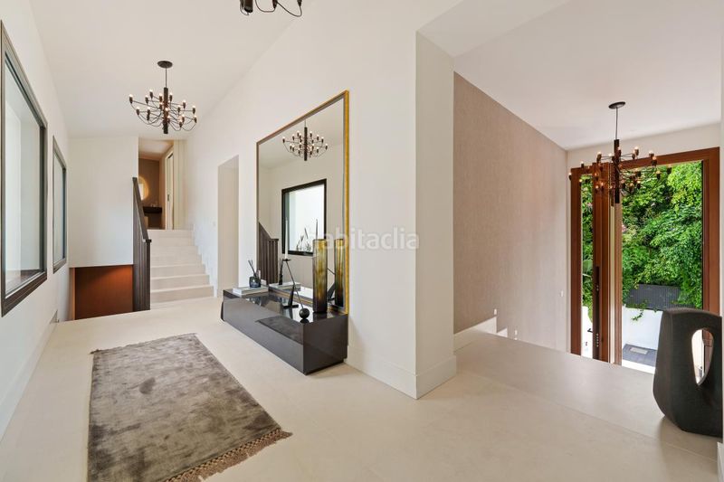 Foto f00e0113-b54f-47f6-a418-e09ecd7494bf. Casa amb aparcament piscina a Las Brisas Marbella