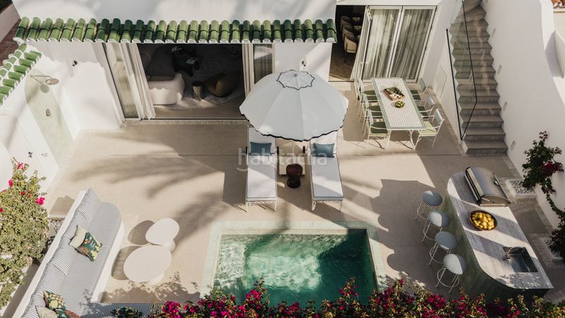 Foto c751c1d7-8b10-4719-b319-b4bb559a0749. Casa aparellada amb piscina a Las Lomas de Río Verde Marbella