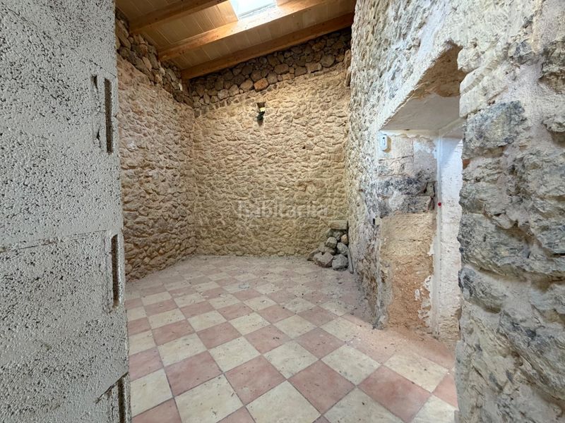 Foto c16ab33e-13da-400b-ad2d-0a599a90f71c. Masía f rústica en terreno edificable a las afueras . en Inca