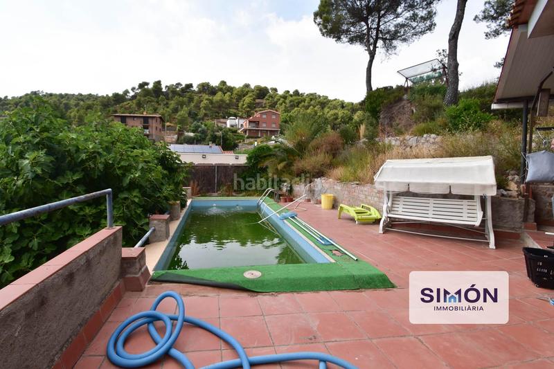 Foto ee38dacd-d075-4ed3-8359-55e78b5fc828. Haus mit parking pool in Rellinars