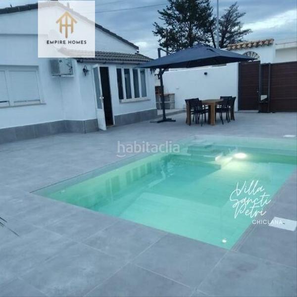 Foto 66396873-f84b-4c95-9b12-8e57474ee39c. Location chalet avec parking piscine dans Los Gallos Chiclana de la Frontera