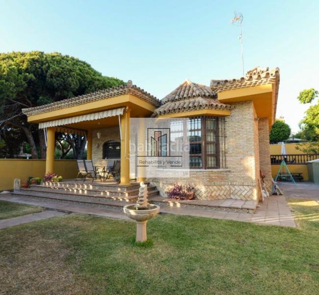 Foto 16c3e9e6-07ce-4bba-99b7-4b755695e6ac. Chalet con camino parcheggio piscina in La Barrosa Chiclana de la Frontera