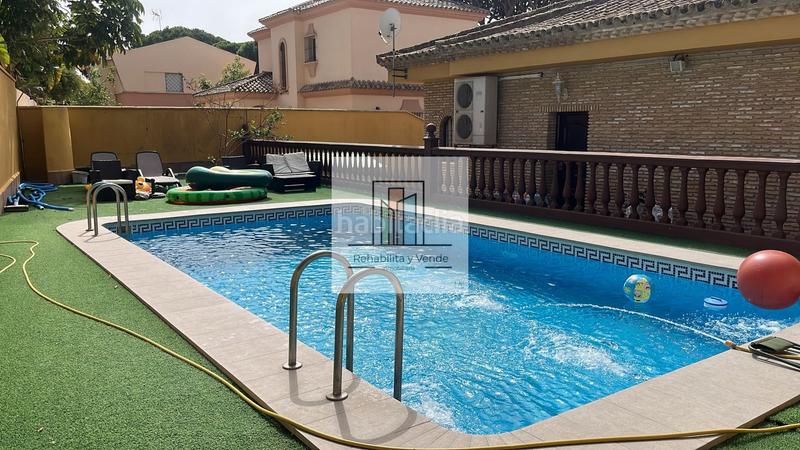 Foto 6b1cb92b-4e9c-4e2d-963b-2156f9e9cc04. Chalet con camino parcheggio piscina in La Barrosa Chiclana de la Frontera