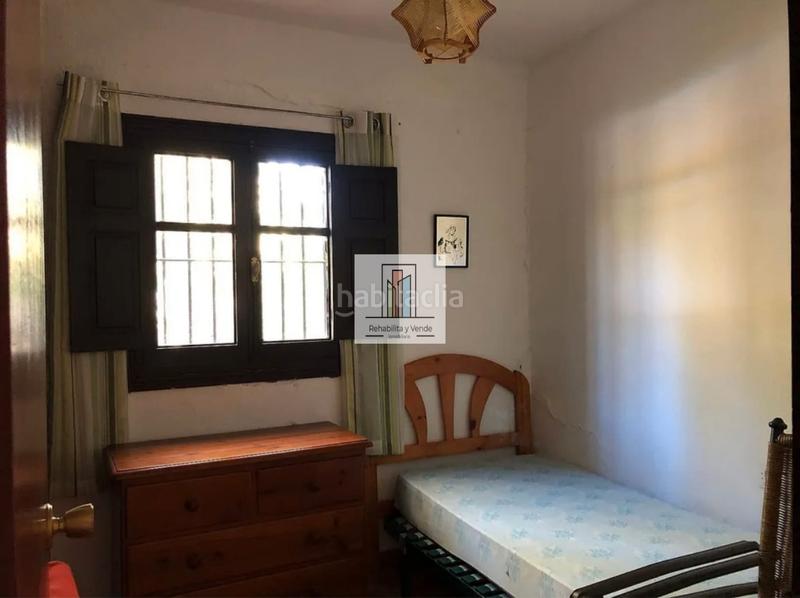 Foto b91b5566-5272-49a7-9f62-1a6114bab276. Xalet amb xemeneia aparcament piscina a La Barrosa Chiclana de la Frontera