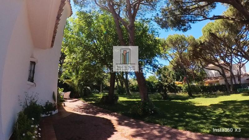 Foto c7b756ce-c603-4b86-b74a-0ca06a2d1f10. Chalet avec cheminée parking dans La Barrosa Chiclana de la Frontera