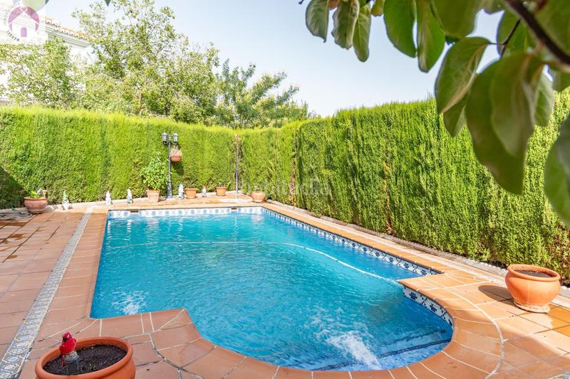 Foto 02e7eb20-3bcb-4d9d-a57f-e92441c67b0e. Casa vive la tranquilidad con espacio en este impresionante chalet pareado en el ventorrillo, cullar vega en Cúllar Vega
