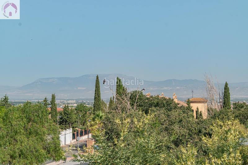 Foto 5e639487-5e39-43cc-bdc9-c0dd21a6e8f8. Casa vive la tranquilidad con espacio en este impresionante chalet pareado en el ventorrillo, cullar vega en Cúllar Vega