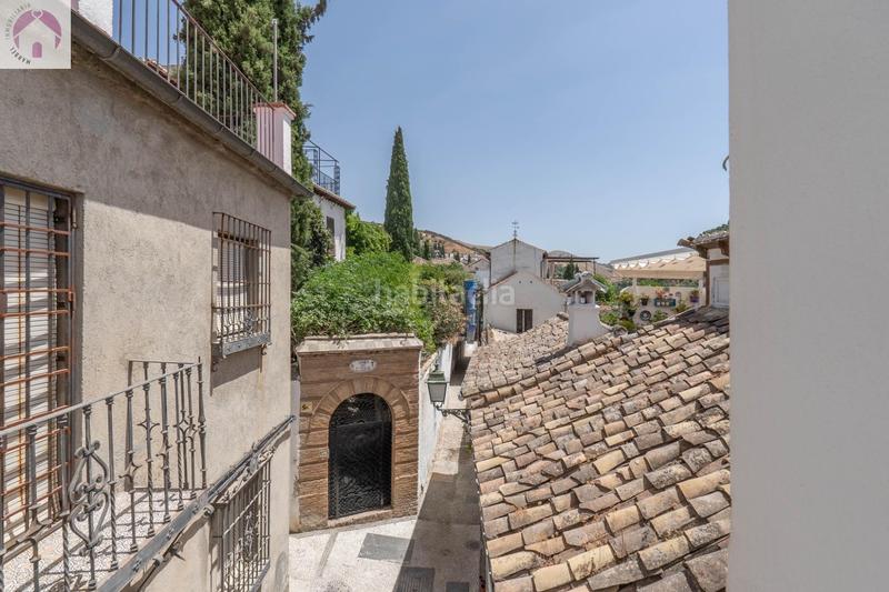Foto eb1013d0-a8c9-409c-8de8-cad7f7c3b2c9. Casa dos maravillosas casas en el albaicín con vistas panorámicas a la alhambra en Granada