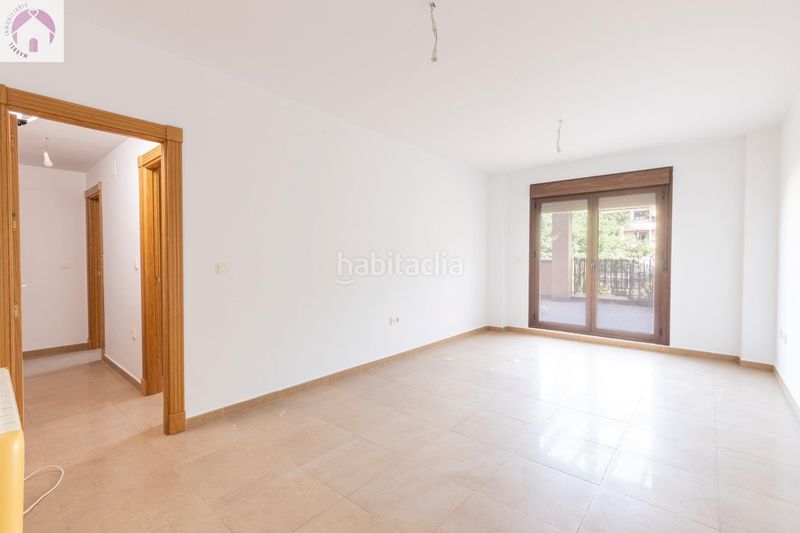 Foto f575bec8-ae53-4d03-b73e-a1ae67ec0e72. Pis amb calefacció aparcament a Atarfe
