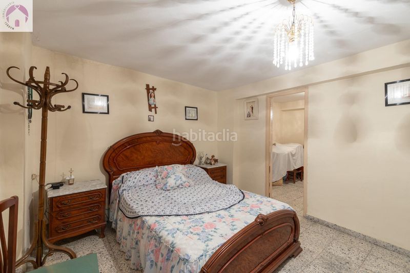 Foto 29ecb4b9-80b8-4cd8-a613-55efb34a76b5. Casa adosada en calle calle nueva de cartuja 9 bonita casa para reformar en Granada