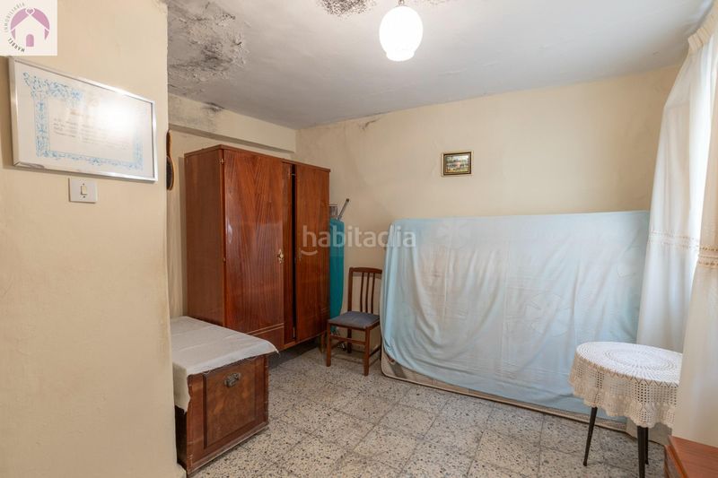 Foto 9735eca7-082f-432e-b1e6-696ab1572406. Casa adosada en calle calle nueva de cartuja 9 bonita casa para reformar en Granada