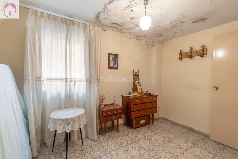 Foto f67e89d7-3041-4bfe-811f-1a4e9fb0d5fa. Casa adosada en calle calle nueva de cartuja 9 bonita casa para reformar en Granada