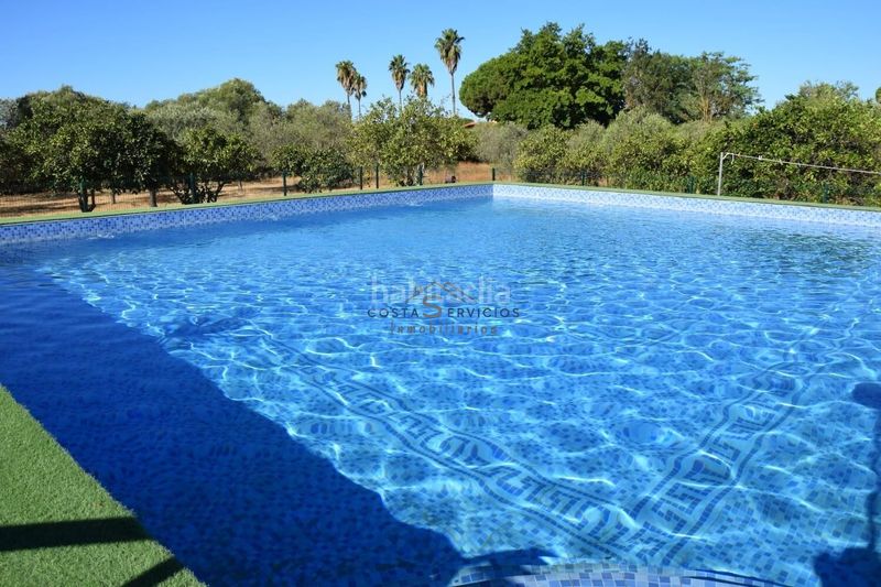 Foto b4b957d3-bfc7-4a50-993a-a0115b1aea6b. Masia amb aparcament piscina a Gibraleón