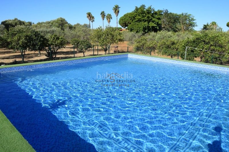 Foto dfaedb32-d454-4fa5-ace4-7a83fec76313. Masia amb aparcament piscina a Gibraleón