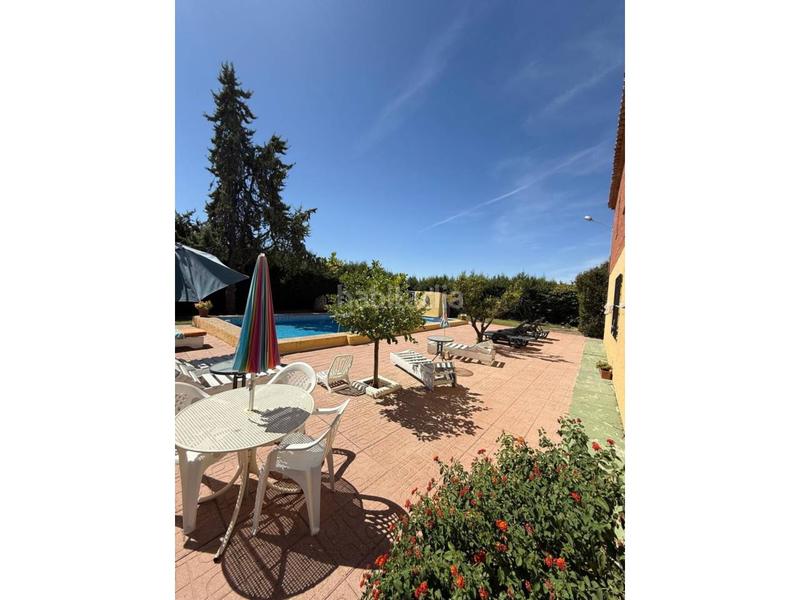 Foto dfe93354-ba39-4fc0-8200-b2ccca68b954. Masía venta de chalet rústico en Úbeda