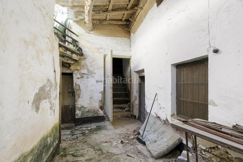 Foto 2cb6767a-68aa-412d-aced-f56b5a7bef06. Masía en calle de la iglesia 20 gran vivienda para reformar en el centro de dilar en Dílar