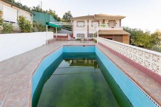 Chalet  Calle extrarradio 321. Chalet con piscina y dos apartamentos en cogollos vega granada
