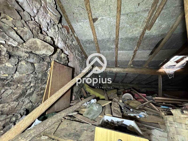 Foto 21ebc8f7-4bb8-4f3c-8573-89b3f051fcab. Casa adosada casa con huerto y cuadra para reformar en Llanes