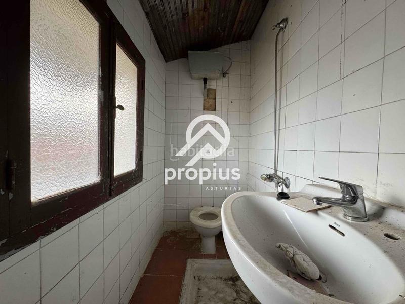Foto 78ded9b9-1b5f-4977-a8b5-d57bae1c12c4. Casa adosada casa con huerto y cuadra para reformar en Llanes
