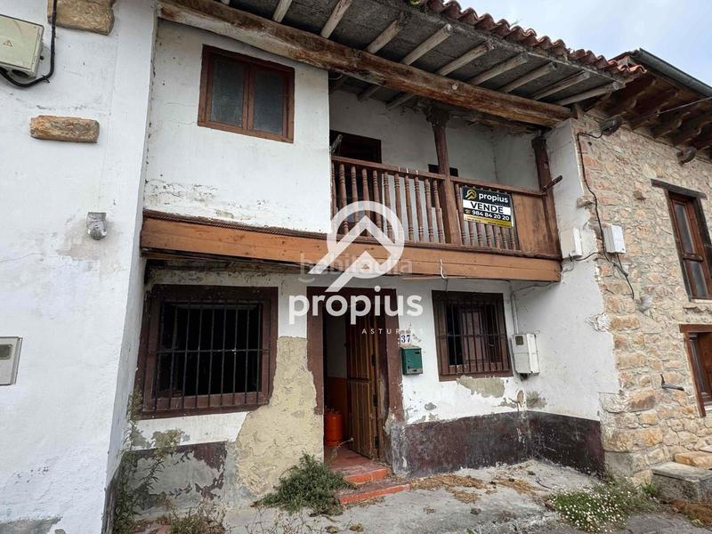 Foto 96e2120e-6974-4839-bfd1-0939b1031ae5. Casa adosada casa con huerto y cuadra para reformar en Llanes