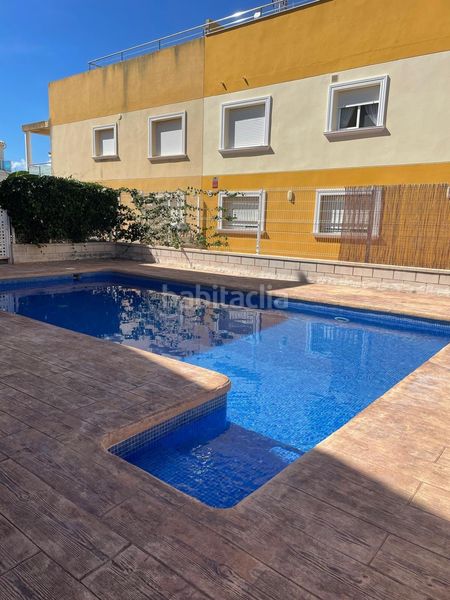 Foto cec9d3a9-f068-429d-baf6-be50a442abde. Rent duplex with pool in Oliva playa Oliva