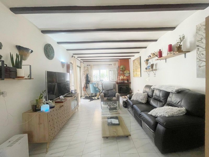 Foto bc1a7a50-e554-40ef-83bc-433874e1feb8. Casa adossada amb calefacció aparcament a Les Bassetes - El Marjal Dénia