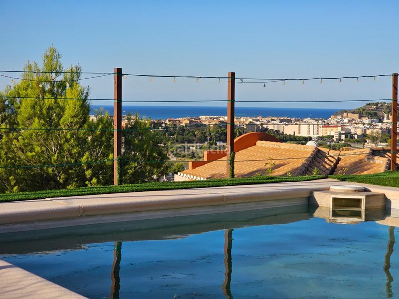 Foto 5214271d-38a8-4ae6-a165-800277b42223. Casa adossada amb calefacció aparcament piscina a Dénia