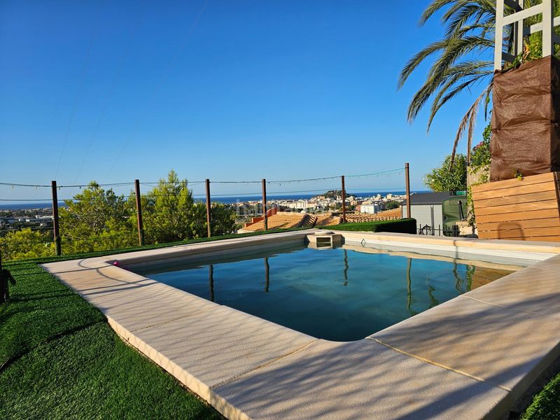 Foto 897d85f2-4837-484e-bcdd-4d52fd671712. Casa adossada amb calefacció aparcament piscina a Dénia